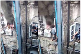 缅男子沿水管爬三楼救火灾被困女子 被赞